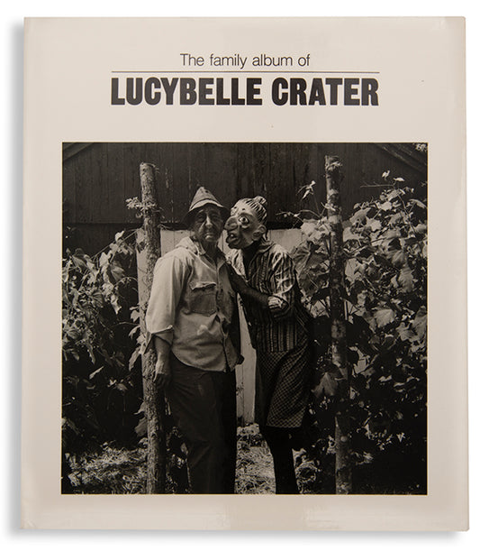 This is Ralph Eugene Meatyard's best-known work, for which he cast his wife Madelyn as the mask-wearing central character Lucybelle Crater, a name adapted from a character in a Flannery O'Connor short story.