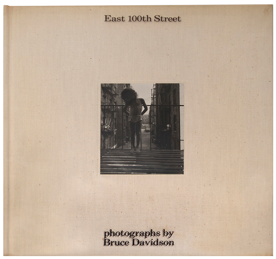 Bruce Davidson regularly visited East Harlem with a view camera and tripod with which he photographed the residents of a city block on East 100th Street between First and Second Avenues in New York. Davidson chose this block because, at the time, it had a reputation as being one of the worst in the city.