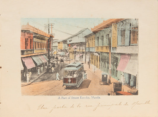 An evocative series of colour photographs of the Philippines, ranging from views of Manilla harbour to domestic scenes such as a butcher's shop, washer-women, market scenes, rice cleaning, and a cock fight.