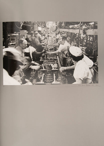 Robert Frank's Flower Is consists of three bodies of work. It begins with photographs taken in Paris of flowers, flower sellers, and chance encounters on the street, continues in a car factory in Detroit, and ends with polaroids made in Mabou Mines, Nova Scotia.