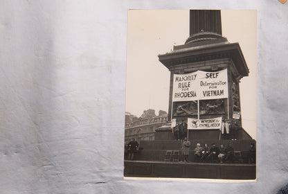 These photographs show the interior and exterior of the I Was Lord Kitchener's Valet boutique on Portobello Road and an anti-apartheid rally in November 1966.
