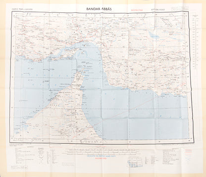 An excellent example of a double-sided coloured escape map of the Arabian Gulf, showing the UAE and Oman to recto, and Qatar to verso.