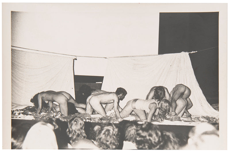 Photographs by David Crosswaite of Carolee Schneemann's 'Thames Crawling' performance at the 1970  International Underground Film Festival at the National Film Theatre, London.