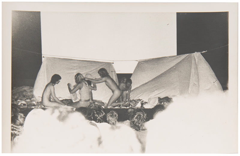 Photographs by David Crosswaite of Carolee Schneemann's 'Thames Crawling' performance at the 1970  International Underground Film Festival at the National Film Theatre, London.