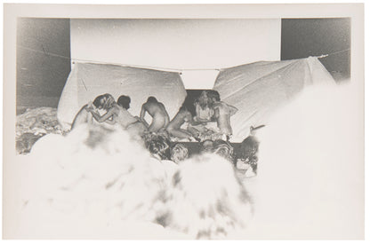 Photographs by David Crosswaite of Carolee Schneemann's 'Thames Crawling' performance at the 1970  International Underground Film Festival at the National Film Theatre, London.