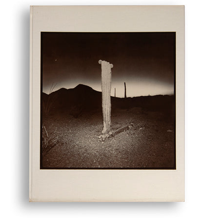 These photographs are taken with a strobe flash in the desert at night, revealing cacti and details of the desert floor. For Richard Misrach, an important conceptual component of this book is the lack of a title, with the publisher's information appearing on the spine and nowhere else.