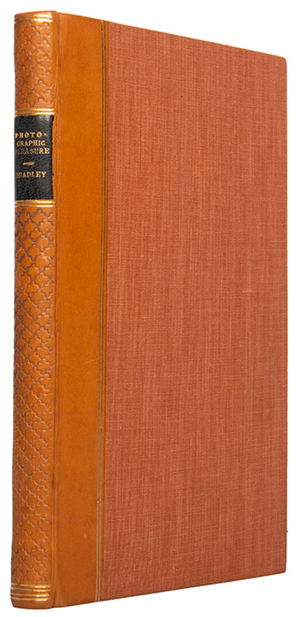 The first edition of Photographic Pleasures by Cuthbert Bede, containing 24 amusing hand-coloured plates depicting visual puns.