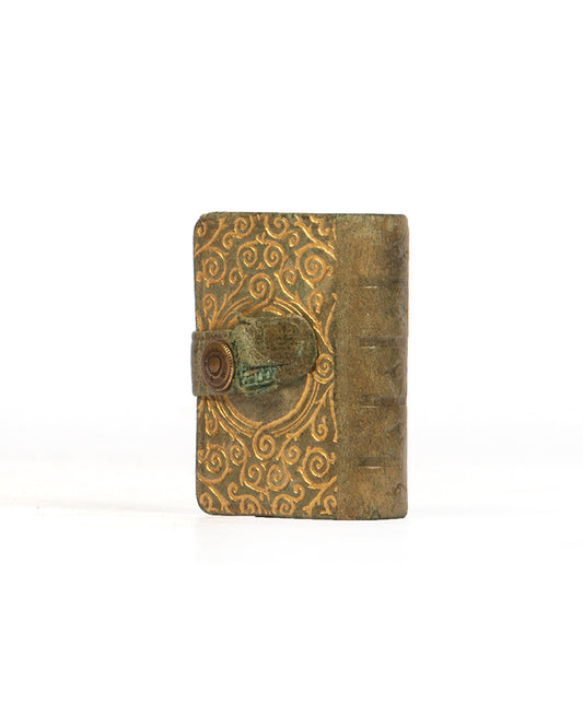 A later Steinbrener edition of the miniature printed Qur'an, from circa 1940.