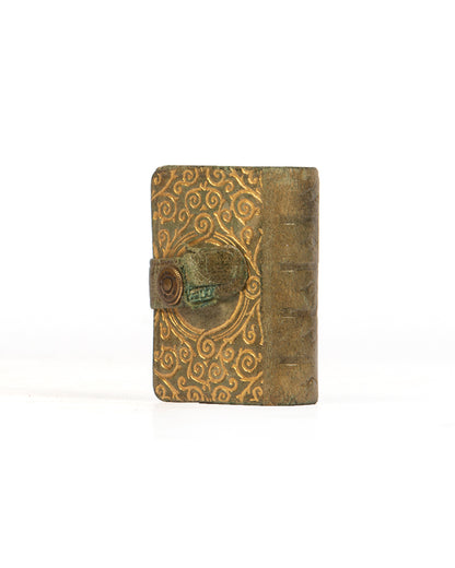 A later Steinbrener edition of the miniature printed Qur'an, from circa 1940.
