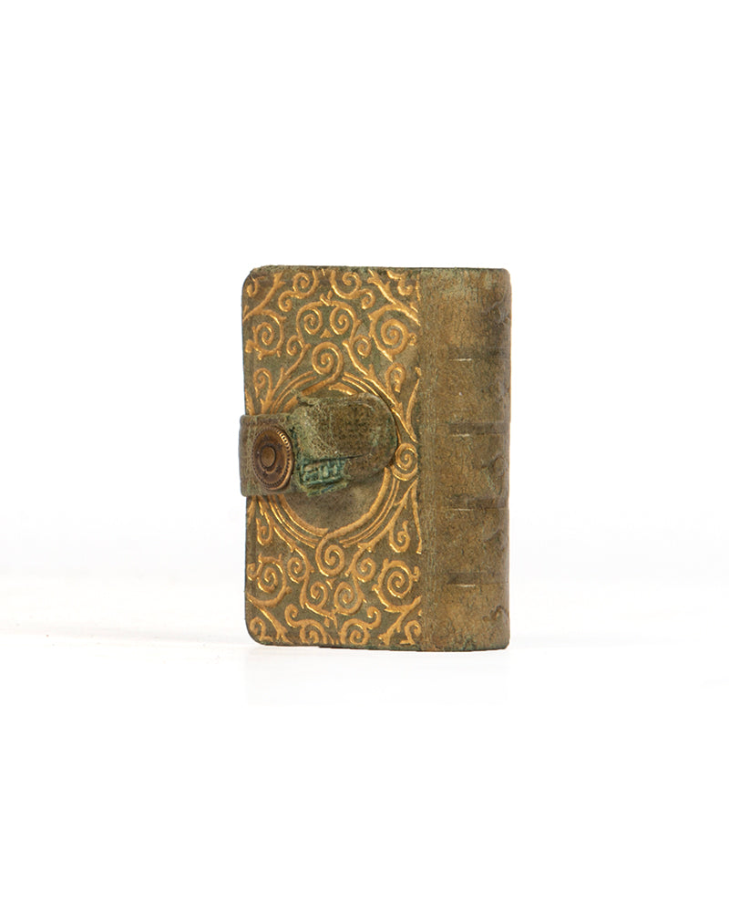 A later Steinbrener edition of the miniature printed Qur'an, from circa 1940.