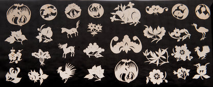 An exceptional album containing hundreds of delicate and elaborate Chinese jianzhi paper cut-outs.