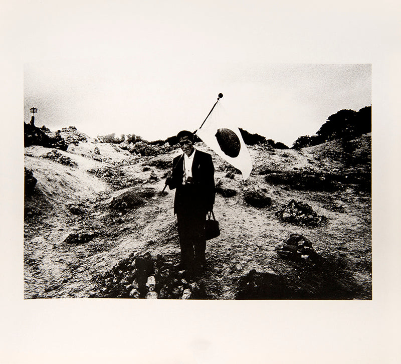Zokushin is Tsuchida's first book, containing photographs taken between 1968 and the mid-1970s at a time when the country was transitioning towards a more modern and Western culture.