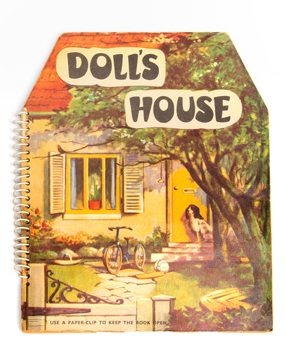A charming pop-up book, extremely well-preserved, which fold out 360 degrees to create a functioning open walled doll house, containing 4 rooms: a living room, kitchen, bathroom and bedroom.