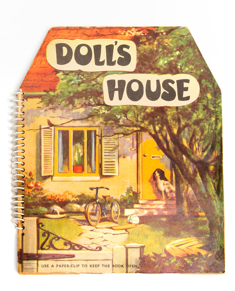 A charming pop-up book, extremely well-preserved, which fold out 360 degrees to create a functioning open walled doll house, containing 4 rooms: a living room, kitchen, bathroom and bedroom. 