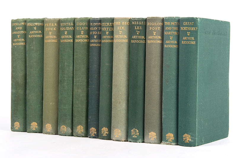 Mixed editions of the complete Swallows and Amazons series by Arthur Ransom, signed by the author in four vols.