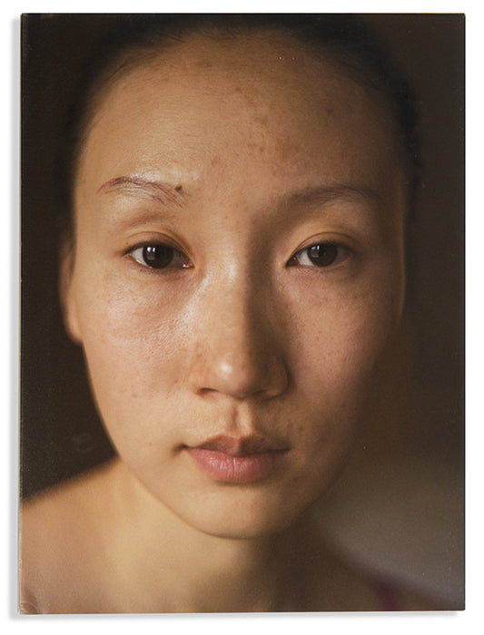 This Face contains 500 photographs by Xu Yong of Zi U, a Chinese sex worker in Beijing.