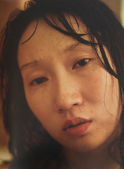 This Face contains 500 photographs by Xu Yong of Zi U, a Chinese sex worker in Beijing.