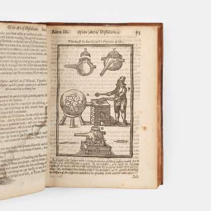 The enlarged third edition of physician John French's work on the distillation of pharmaceuticals, The Art of Distillation, with numerous woodcut illustrations, 1664.