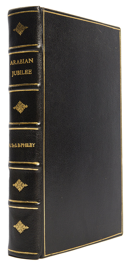 Finely bound first edition of Harry St. John Philby's Arabian Jubilee, the first full-length biography of King Saud.