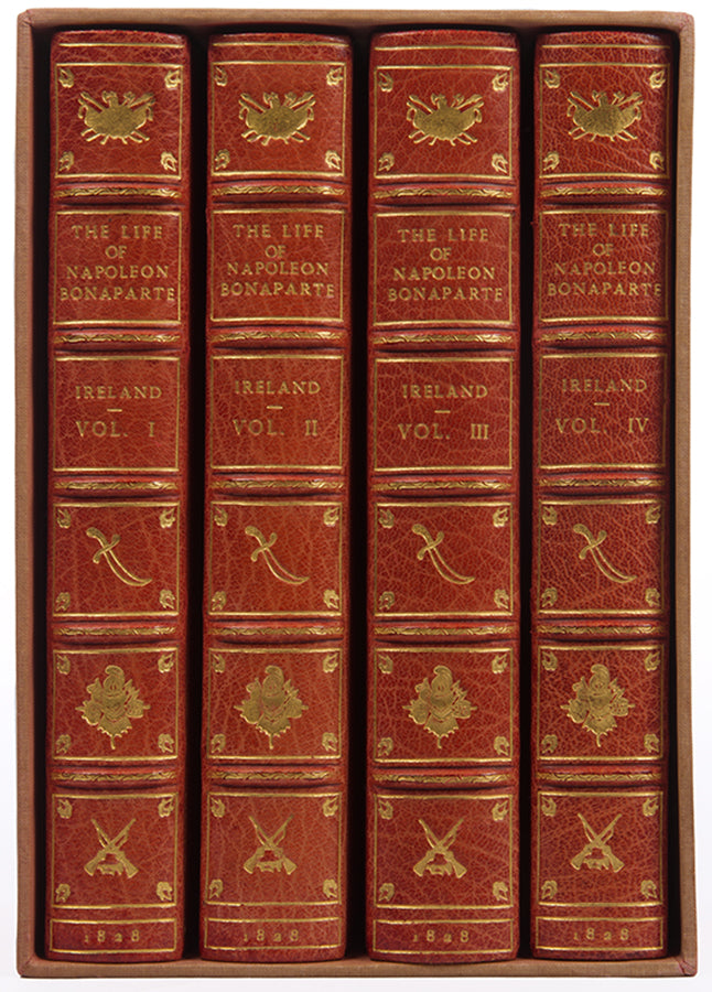 A handsome set of Ireland's Life of Napoleon, illsutrated with 26 aquatints by George Cruikshank, and bound in red morocco by Bayntun Riviere.