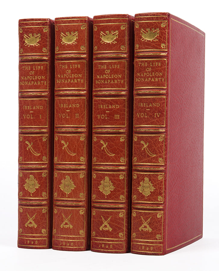 A handsome set of Ireland's Life of Napoleon, illsutrated with 26 aquatints by George Cruikshank, and bound in red morocco by Bayntun Riviere.