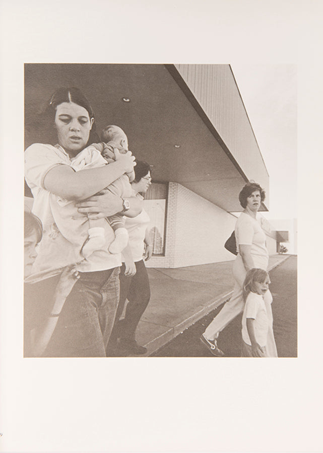 After witnessing a plume of smoke rising from the Rocky Flats Nuclear Weapons Plant located ten miles from his home Adams made this series of photographs of the people of Denver and its suburbs.