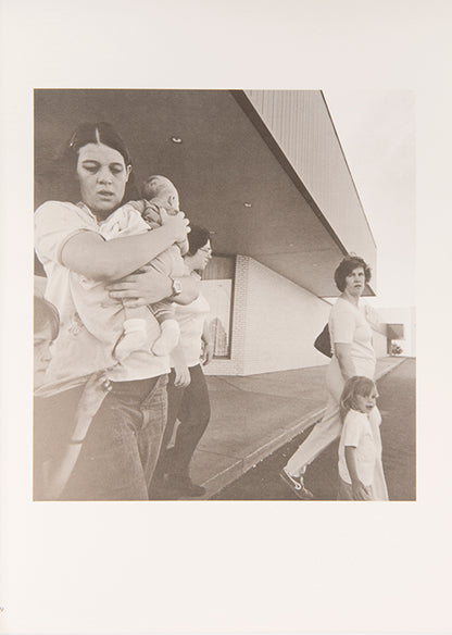 After witnessing a plume of smoke rising from the Rocky Flats Nuclear Weapons Plant located ten miles from his home Adams made this series of photographs of the people of Denver and its suburbs.