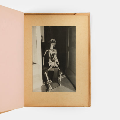 La Poupee evolved out of a series of events in Hans Bellmer's personal life: his cousin, Ursula Naguschewski moving from Kassel to Berlin in 1932, his attendance of a performance of Jacques Offenbach'sTales of Hoffmann, and his mother shipping him his old toys. 