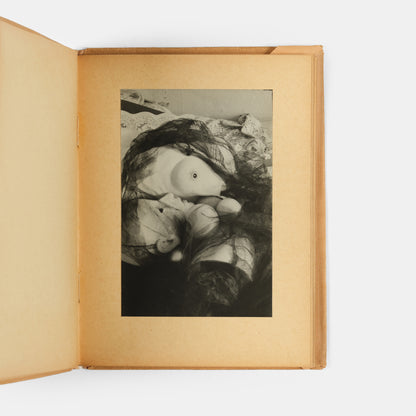 La Poupee evolved out of a series of events in Hans Bellmer's personal life: his cousin, Ursula Naguschewski moving from Kassel to Berlin in 1932, his attendance of a performance of Jacques Offenbach'sTales of Hoffmann, and his mother shipping him his old toys. 