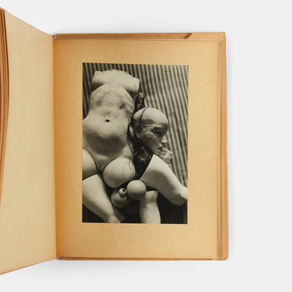 La Poupee evolved out of a series of events in Hans Bellmer's personal life: his cousin, Ursula Naguschewski moving from Kassel to Berlin in 1932, his attendance of a performance of Jacques Offenbach'sTales of Hoffmann, and his mother shipping him his old toys. 