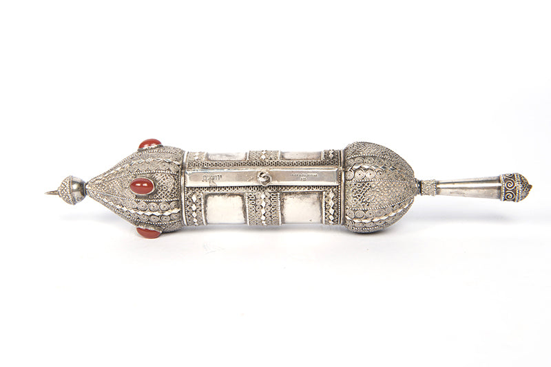 A beautiful example of a Bezalel Megillat Esther on vellum, housed in a silver case with elaborate filigree and semiprecious stones.