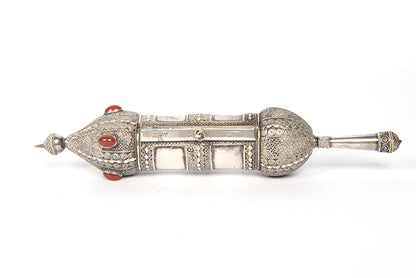 A beautiful example of a Bezalel Megillat Esther on vellum, housed in a silver case with elaborate filigree and semiprecious stones.