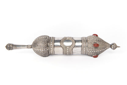 A beautiful example of a Bezalel Megillat Esther on vellum, housed in a silver case with elaborate filigree and semiprecious stones.