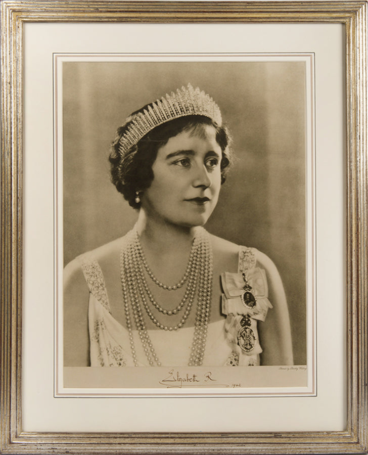 Black & white photographic prints of King George VI by Hugh Cecil, signed and dated by the King, the other of Queen Elizabeth by Dorothy Wilding, also signed and dated