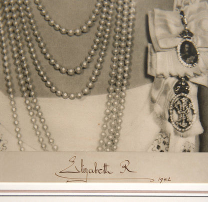 Black & white photographic prints of King George VI by Hugh Cecil, signed and dated by the King, the other of Queen Elizabeth by Dorothy Wilding, also signed and dated
