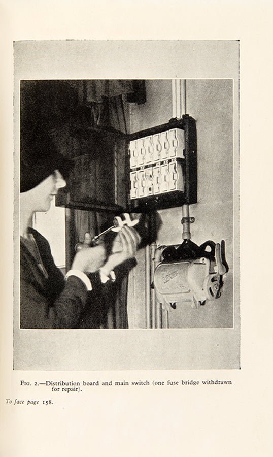 The rare first edition of The Electrical Handbook for Women, edited by Caroline Haslett, in the uncommon and stylish Art Deco dust jacket.