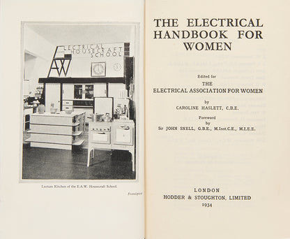 The rare first edition of The Electrical Handbook for Women, edited by Caroline Haslett, in the uncommon and stylish Art Deco dust jacket.