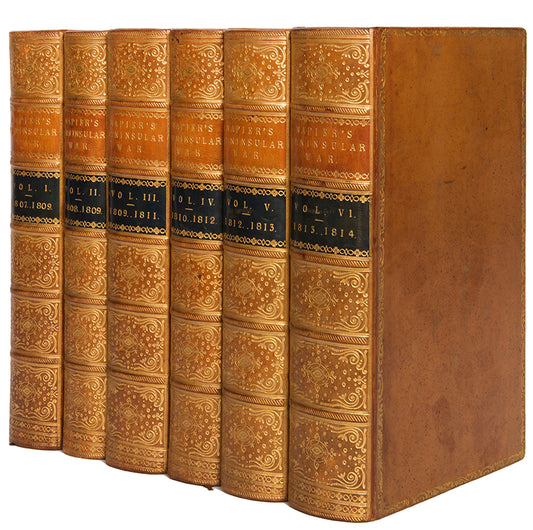 A superlative, first edition set of Napier's History of the War in the Peninsular, in sprinkled calf by Riviere, illustrated with 55 engraved plates