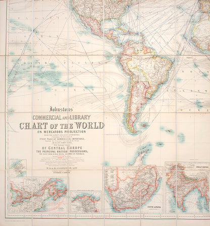 The turn of the century issue of W. & A.K. Johnston's Commercial and Library Chart of the World, an impressive world map focused on trading routes.