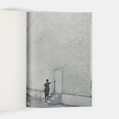 This company book includes Jakob Tuggener's photographs of the machinery in Maschinenfabrik Oerlikon's workshops and the men and women who operate it.