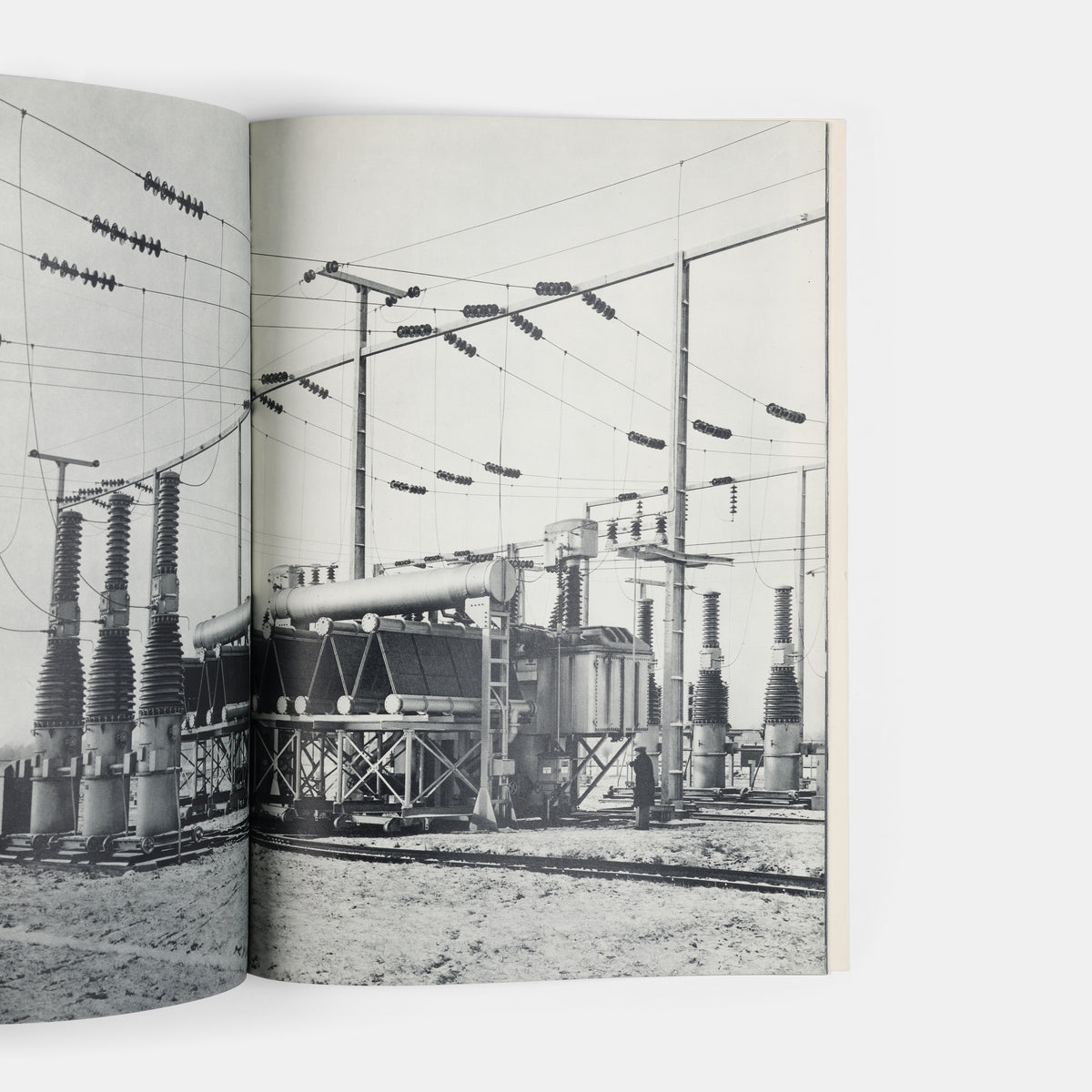 This company book includes Jakob Tuggener's photographs of the machinery in Maschinenfabrik Oerlikon's workshops and the men and women who operate it.