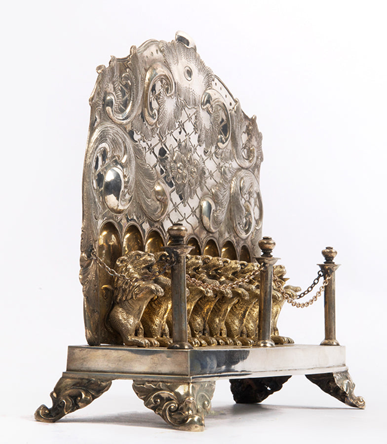 A magnificent example of 19th-century German 750 silver Hanukkah oil lamp, in great condition, missing the detachable shamash, as is often the case with Hanukkiot of that period.