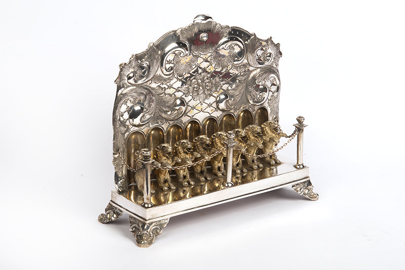 A magnificent example of 19th-century German 750 silver Hanukkah oil lamp, in great condition, missing the detachable shamash, as is often the case with Hanukkiot of that period.