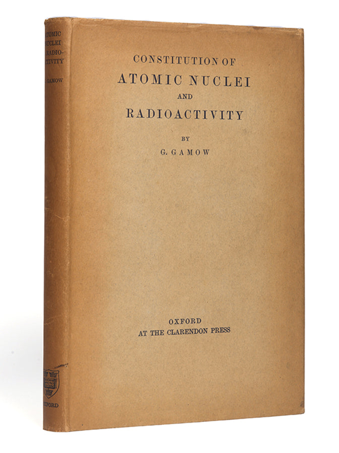 First edition of the first textbook of nuclear physics, George Gamow's Constitution of Atomic Nuclei & Radioactivity, in the rare dust jacket.