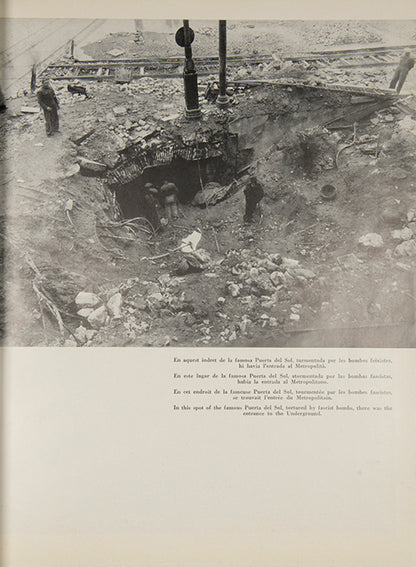 This publication includes photographs by David 'Chim' Seymour, Gerda Taro, and Robert Capa, which portray the destruction wrought on the Madrid and its people during the Spanish Civil War.