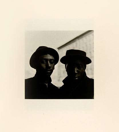 Bruce Davidson regularly visited East Harlem with a view camera and tripod with which he photographed the residents of a city block on East 100th Street between First and Second Avenues in New York. Davidson chose this block because, at the time, it had a reputation as being one of the worst in the city.