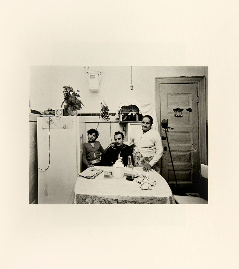 Bruce Davidson regularly visited East Harlem with a view camera and tripod with which he photographed the residents of a city block on East 100th Street between First and Second Avenues in New York. Davidson chose this block because, at the time, it had a reputation as being one of the worst in the city.
