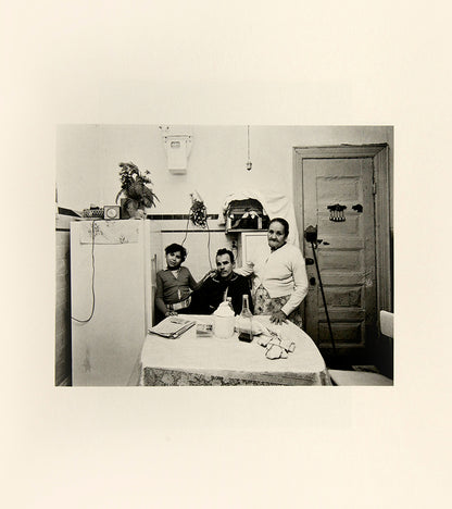 Bruce Davidson regularly visited East Harlem with a view camera and tripod with which he photographed the residents of a city block on East 100th Street between First and Second Avenues in New York. Davidson chose this block because, at the time, it had a reputation as being one of the worst in the city.