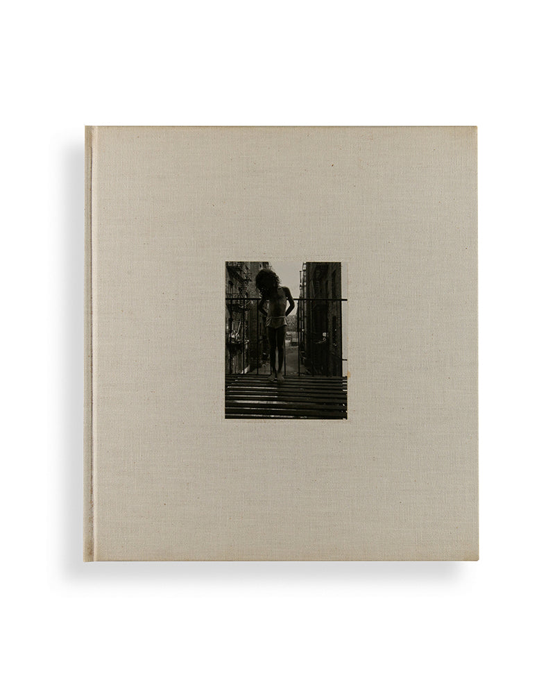 Bruce Davidson regularly visited East Harlem with a view camera and tripod with which he photographed the residents of a city block on East 100th Street between First and Second Avenues in New York. Davidson chose this block because, at the time, it had a reputation as being one of the worst in the city.