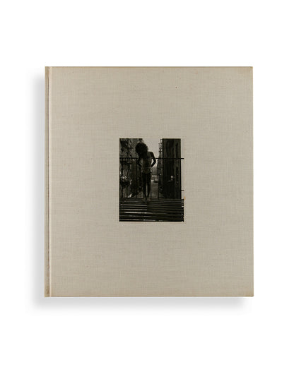 Bruce Davidson regularly visited East Harlem with a view camera and tripod with which he photographed the residents of a city block on East 100th Street between First and Second Avenues in New York. Davidson chose this block because, at the time, it had a reputation as being one of the worst in the city.